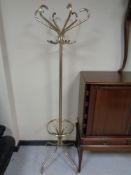 A metal hat and coat stand