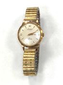 A gent's 9ct gold Accurist wristwatch on plated expanding strap,