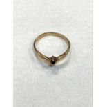 A 9ct gold ring set with a sapphire, 1.3g.