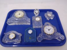 A tray of seven Irish glass and crystal desk clocks