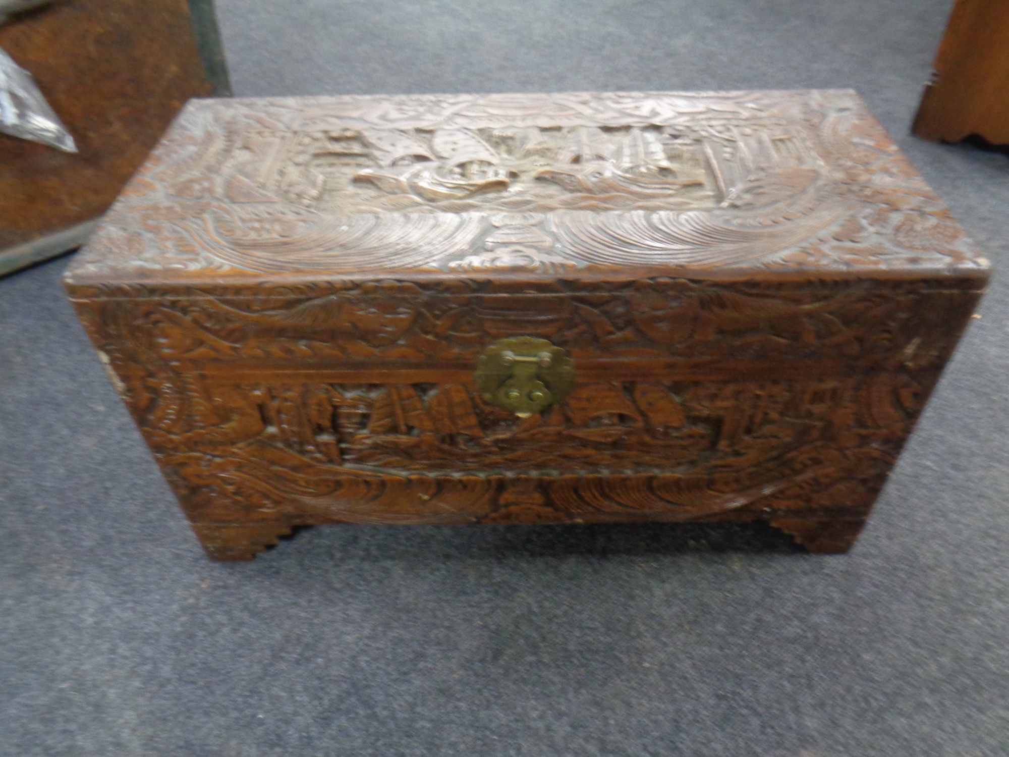 A carved camphor wood blanket box