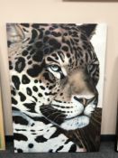 A canvas print depicting a leopard,