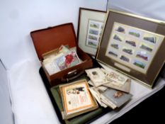 A tray of vintage leather case of antique & later postcards, monochrome photographs,