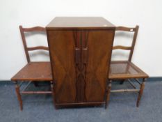 A 1930's walnut music cabinet and two bedroom chairs
