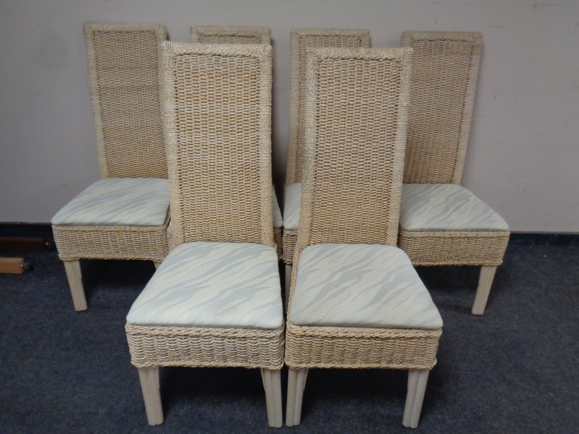 Six contemporary wicker high back dining chairs