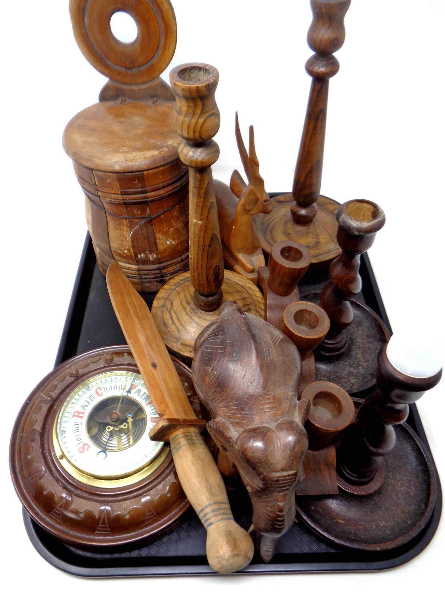 A tray of antique and later wooden pieces to include candlesticks, salt box, barometer,