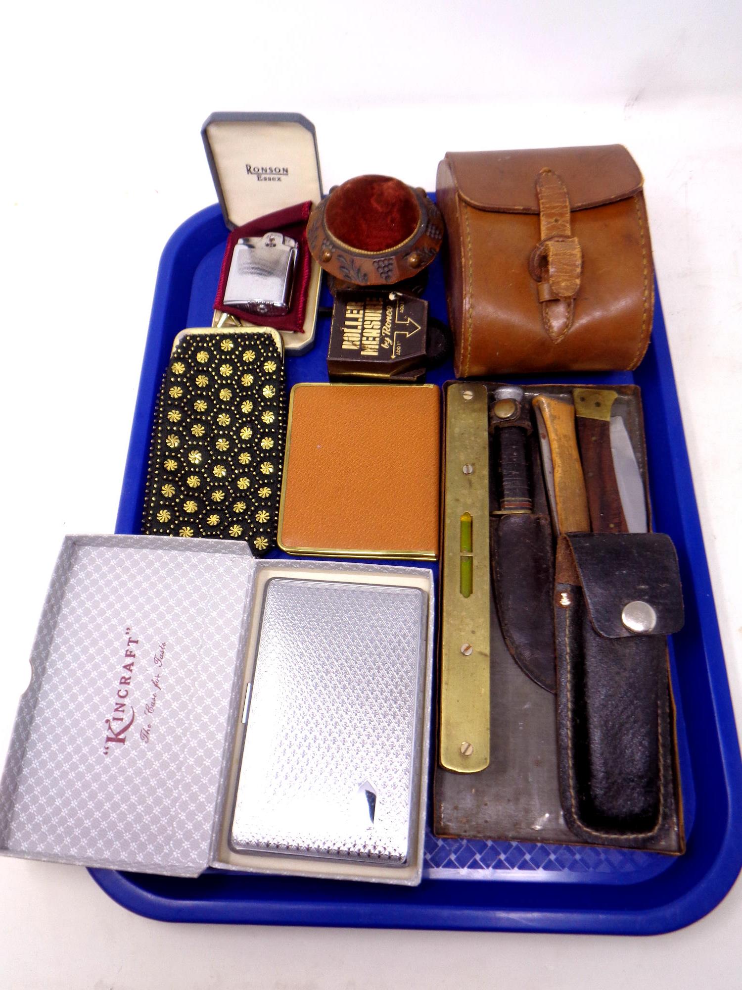 A tray of leather case of cigarette cards, pin cushion, Ronson Essex lighter, pocket knives,