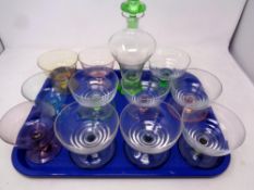 A tray of mid 20th century two-tone glass decanter,