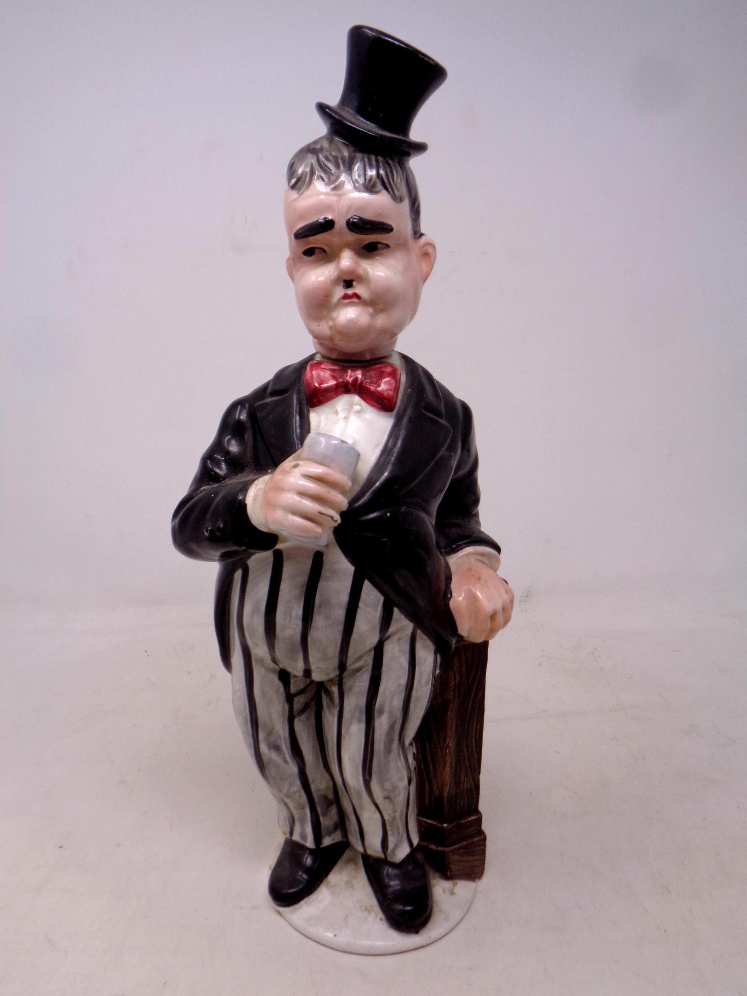 A vintage ceramic Oliver Hardy decanter,