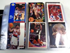 An album of Topps cards, American sports stars, Basketball,