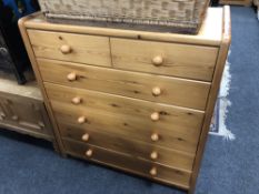 A pine seven drawer chest
