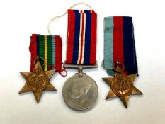 Three WWII medals comprising Africa Star, 1939-1945 Star and War Medal,