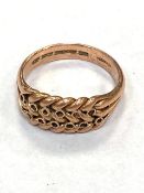 A 9ct gold braided ring, size S. CONDITION REPORT: 5.
