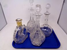 A tray of four decanters,