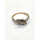 An 18ct gold ring set with diamonds in heart shaped setting, 1.8g.