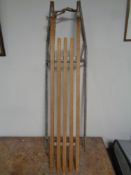A vintage wooden sledge