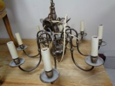 A brass six way chandelier