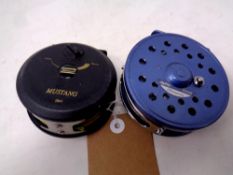 Two Shakespeare fly reels with line