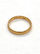 A 22ct gold band ring, size M. CONDITION REPORT: 3.