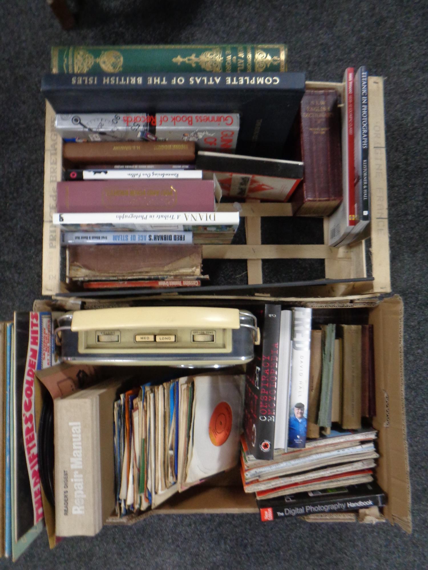 Two boxes of hard back books including New Atlas of the World, vintage Monopoly, Bush radio,