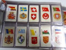 Quantity of John Player Gallagher cigarette cards, drum banners, cap badges, flags of the nation,