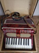 A Laborem piano accordion in case