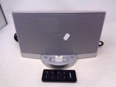 A Bose ipod dock with lead and remote