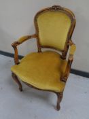A French style carved beech salon armchair