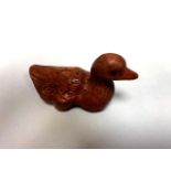 A Japanese carved fruitwood netsuke - Duck.