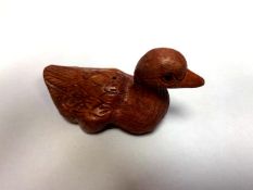 A Japanese carved fruitwood netsuke - Duck.
