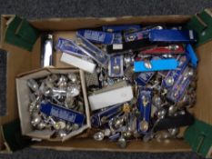 A box of large quantity of silver plated crested spoons