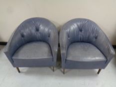 A pair of 20th century leather tub chairs