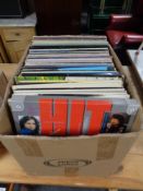 A box of a quantity of vinyl LP's to include many by The Beatles and The Beach Boys including