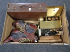 A box of vintage leather briefcase, vintage ice skates, playing cards by Hovis,