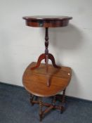 An Edwardian oak gateleg table together with a leather topped drum table