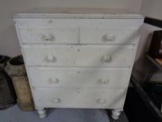 A nineteenth century painted pine five drawer chest