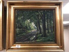 Continental school : a road lined with trees, oil on canvas,