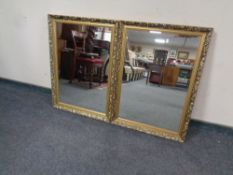 A pair of gilt framed mirrors