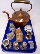 An antique copper and brass kettle, Lilliput ornaments, plated candlesticks,