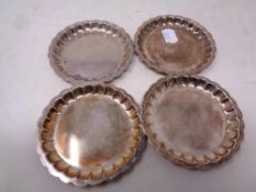 Four Dublin silver 1973 scalloped edged dishes, diameter 8.