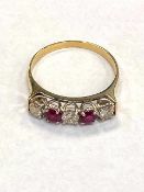 A yellow gold diamond and ruby half eternity ring, approximately 0.45ct.