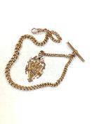 A 9ct gold Albert chain with T-bar and fob engraved Leasingthorne Ambulance,