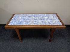 A mid 20th century Danish rosewood tiled topped coffee table