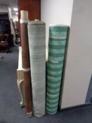 Three rolls of fabric