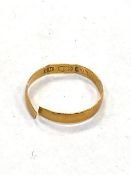 A 22ct gold band ring (broken) CONDITION REPORT: 1.