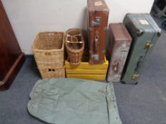 A painted 20th century wooden crate, three wicker baskets,