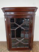 A 19th century hanging astragal glazed door corner cabinet,