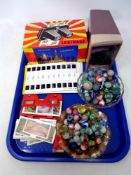 A tray of quantity of glass marbles, Lestrade stereoscope with slides, boxed Weetabix stereo scope,