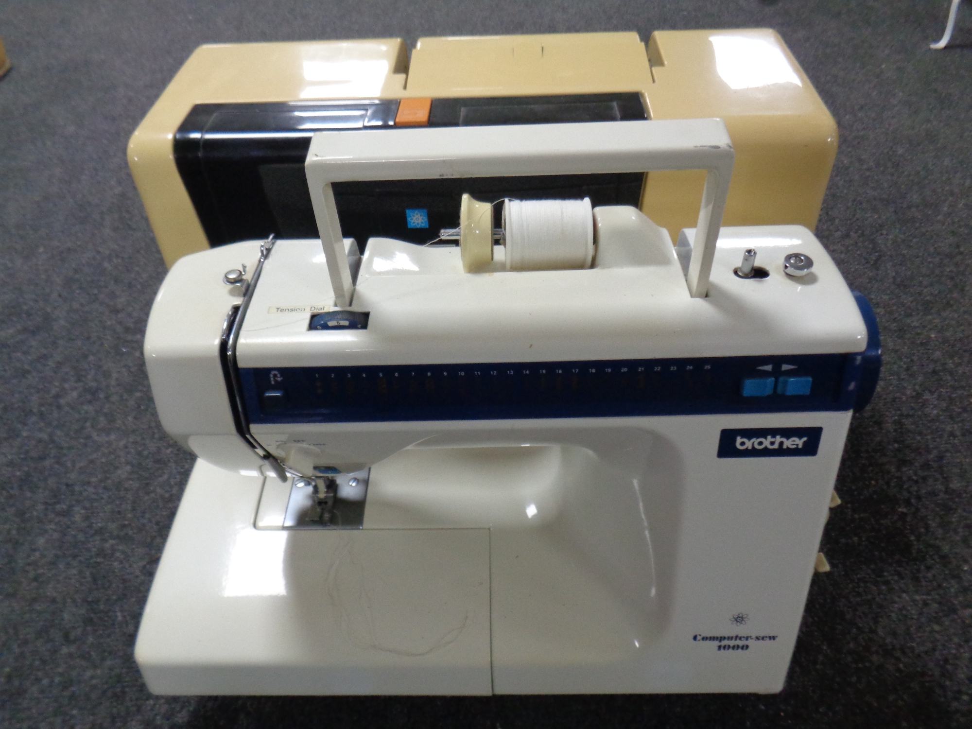 A Brother computer-sew 1000 electric sewing machine in case