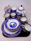 A tray of Ringtons blue and white willow pattern tea and dinner ware,